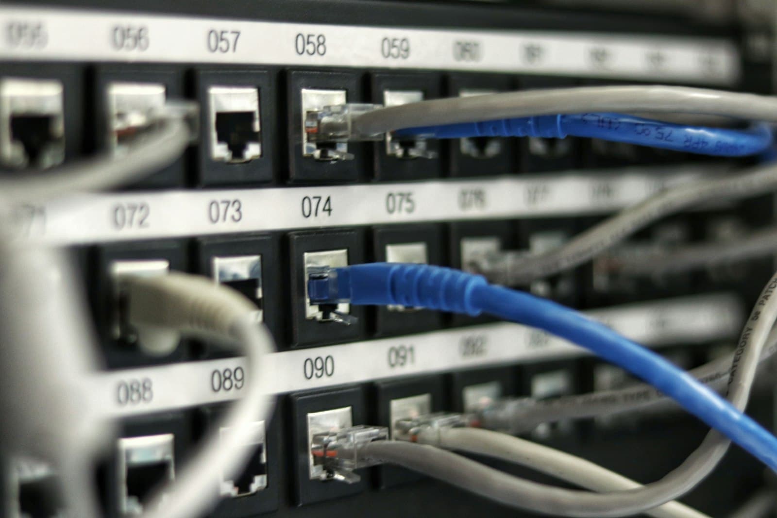 Enterprise network rack with structured fiber cabling and switches